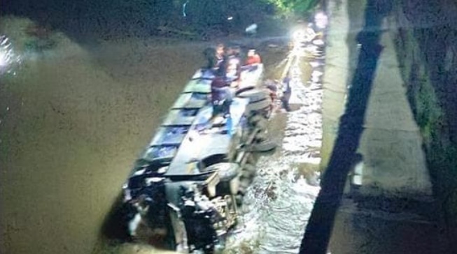 Bus Plunges Into River