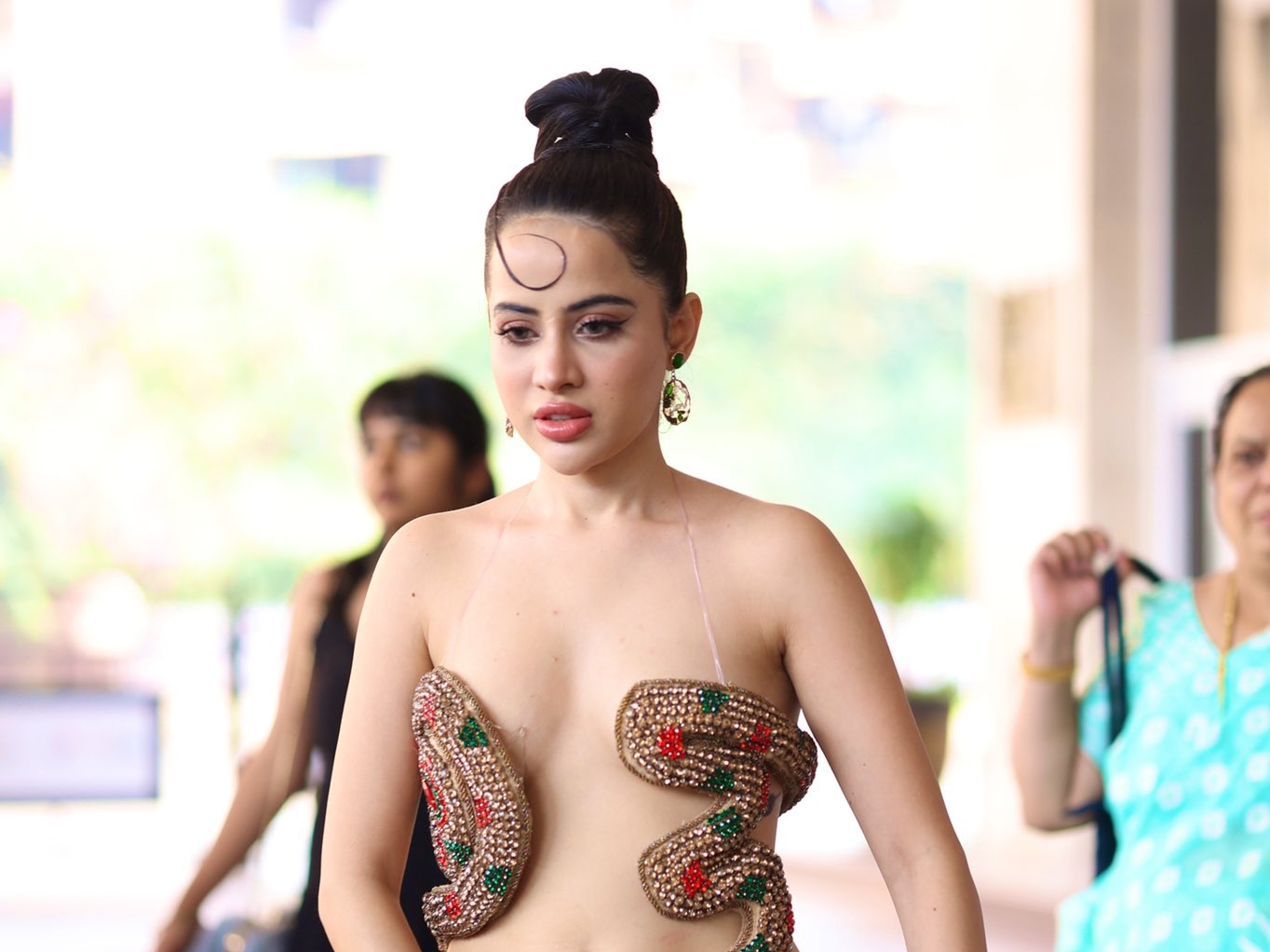 Urfi Javed Stuns In Snake-Shaped Backless Bra With Green Skirt