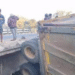 Truck Hangs from Bridge