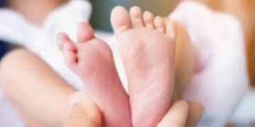 Infant Branded with Hot Metal