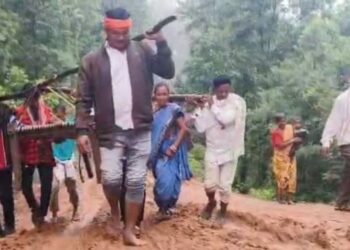 Pregnant Woman Carried on Cot