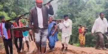 Pregnant Woman Carried on Cot