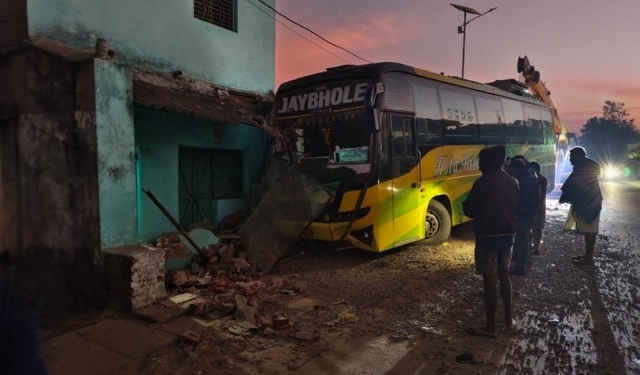 Bus Crashes into House
