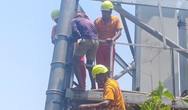 Drunk Youth Climbs Tower