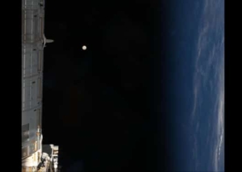 NASA astronaut full moon photo