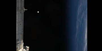 NASA astronaut full moon photo
