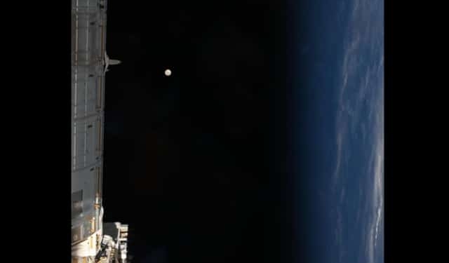 NASA astronaut full moon photo