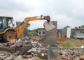 BDA Demolishes 58 Illegal Structures, Reclaims Two Acres of Land in Shampur