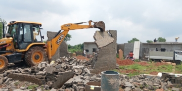 BDA Demolishes 58 Illegal Structures, Reclaims Two Acres of Land in Shampur