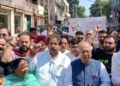 JKPCC protest BJP poster
