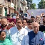 JKPCC protest BJP poster