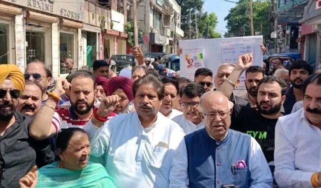JKPCC protest BJP poster