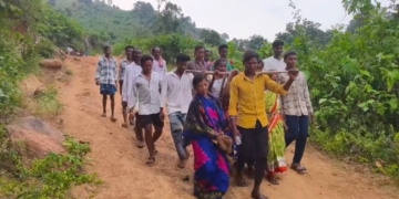 Patient Carried in Makeshift Sling