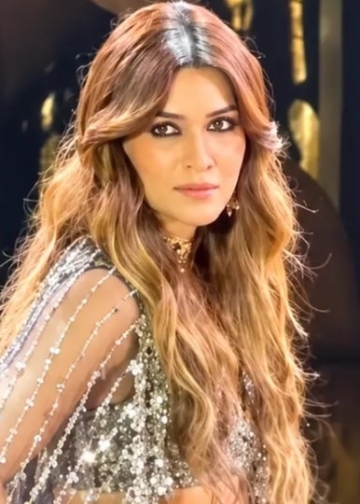 ​Kriti Sanon Ditches Traditional Dupatta for Sheer Cape in Metallic Mirror-Work Lehenga by Abhinav Mishra